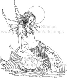 Mermaid Fairy sitting on a rock in the moonlight with dolphin